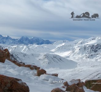 On the horizon, Kyrgyzstan. Mount of Tourists 3954 m. Zailiysky Alatau Kazakhstan.