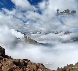 On the horizon, Kyrgyzstan. Mount of Tourists 3954 m. Zailiysky Alatau Kazakhstan.